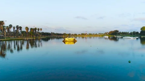 Wake boarder Surfing On The River or Lake. Aerial Video. Ski Surfing Skier Jet Stock Footage 90014045