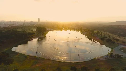 Wake boarder Surfing On The River or Lake. Aerial Video. Ski Surfing Skier Jet Stock Footage 90014249