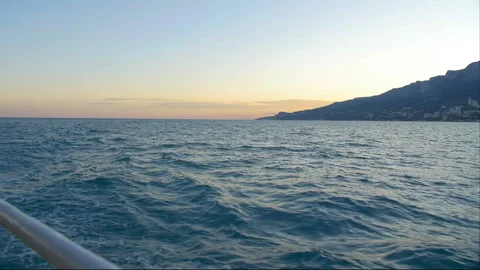 The wake of a boat as seen from the side of a ship. Stock Footage 89834097