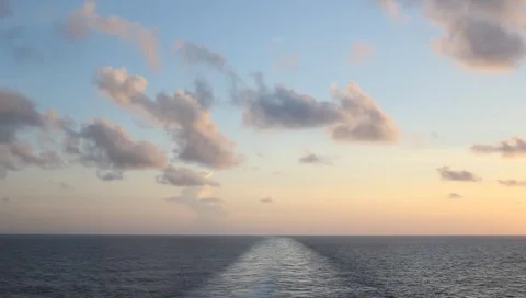 Wake of boat with Thomas Kinkade clouds Video stock 2658576