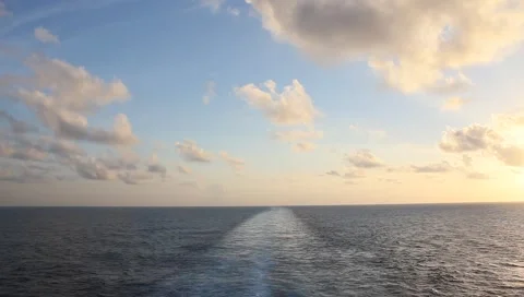 Wake of boat with Thomas Kinkade clouds2 Stock Footage 2657735