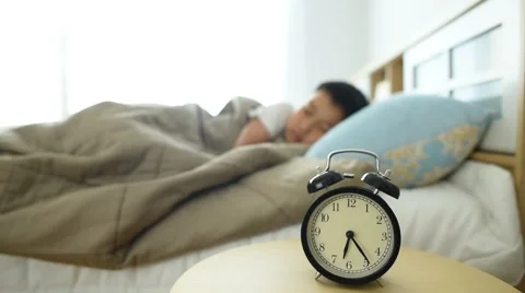 Wake up boy with alarm clock 스톡 동영상 61372940