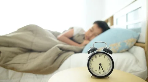 Wake up boy with alarm clock 库存影片 61373002