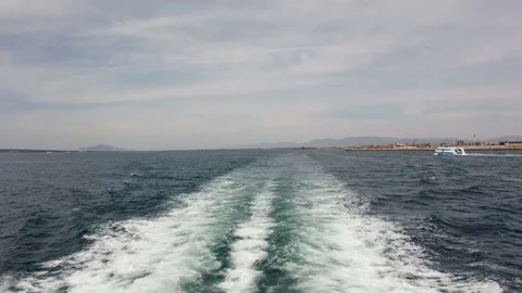 The wake from the ferry to Tabarca with a view of Santa Pola. Stock Footage 152856324