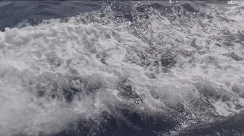 Wake off the side of a boat Stock Footage 49911010