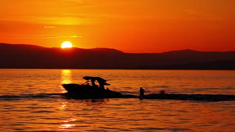Wake Surfer at Sunset on Lake Geneva Switzerland Stock Footage 337946339