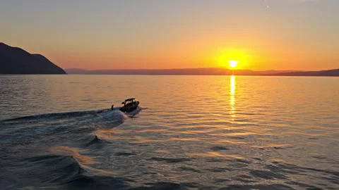 Wake Surfer at Sunset on Lake Geneva Switzerland Stock Footage 337946376