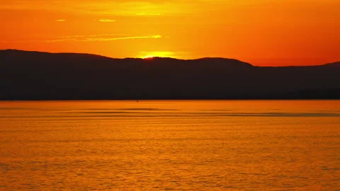 Wake Surfer at Sunset on Lake Geneva Switzerland Stock Footage 337946733
