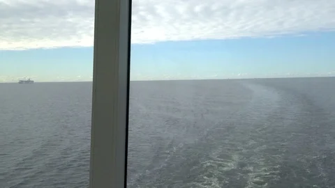 Wake trail in the ship window Stock Footage 110303740