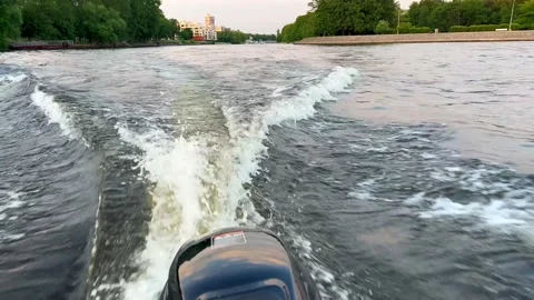 Wake trail of vessel. Foamy trace from small speed boat going along city river N Stock Footage 201674753