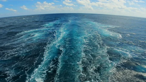 Wake of vessel. Back view. Ocean water. Deep blue. Wide trace Stock Footage 169965093
