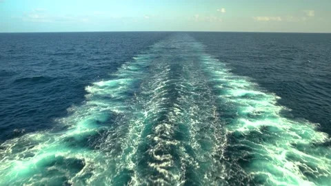 Wake of vessel. Trace from ship. Ocean water. Wide wake trail from boat. Back Stock Footage