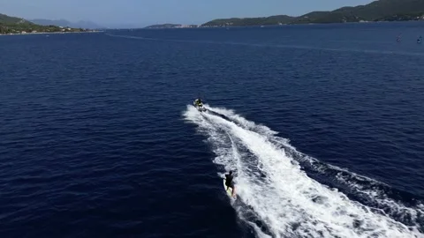 Wakeboard behing Jetski Stock Footage 216918931