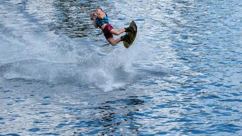 Wakeboard Rider Executing High Jump Trick Photos