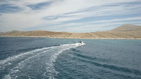 Wakeboarder being pulled by the motorboat in the ocean Stock Footage 85821175