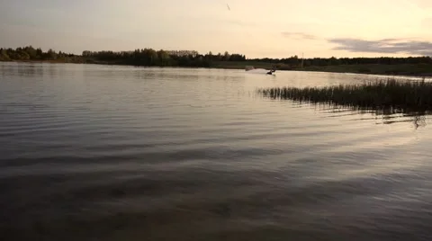 Wakeboarding backroll sunset shooting Stock Footage 67354918