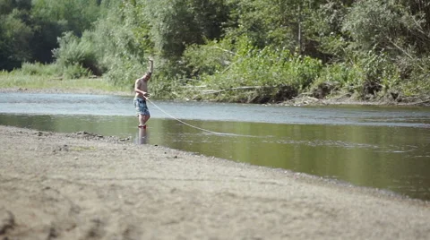 Wakeboarding on the river Stock Footage 69046158