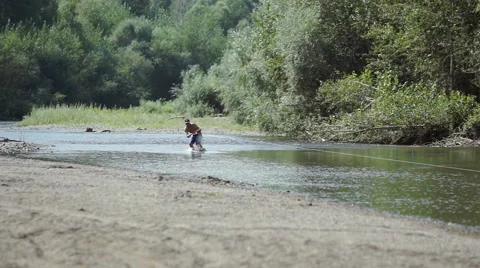 Wakeboarding on the river Stock Footage 69046836