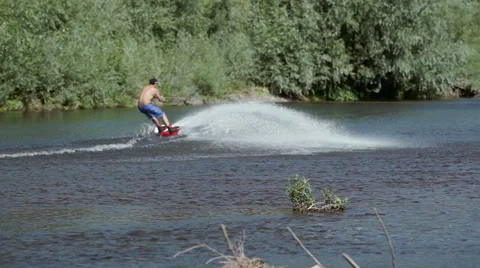 Wakeboarding on the river Stock Footage 69047699