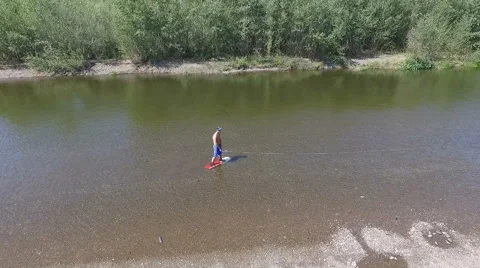 Wakeboarding on the river Stock Footage 69060342