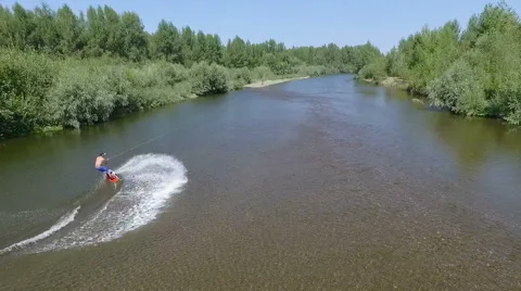 Wakeboarding on the river Stock Footage 69062491