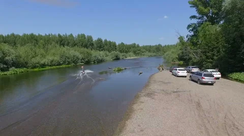 Wakeboarding on the river Stock Footage 69063596