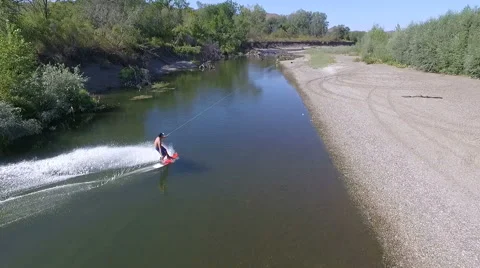 Wakeboarding on the river Stock Footage 69069118