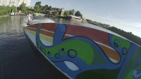 A wakeskater slides on boxes Stock Footage 60056197