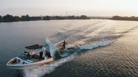 Wakesurfer rides in the river Stock Footage 255621277