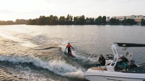 Wakesurfer rides in the river Stock Footage 255621431
