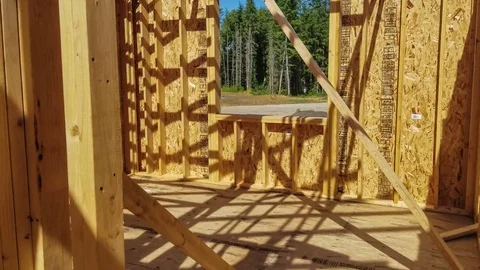Waking through an unfinished home construction site Stock Footage 81384368