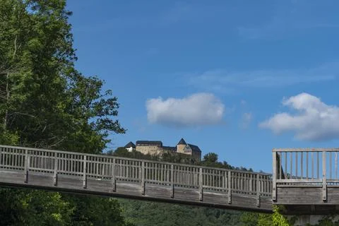 Waldeck Castle, a medieval castle complex with a wooden bridge in the foreground Stock Photos