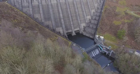 Wales Fly above Dam Stock Footage