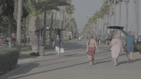 A walk along the beach in Paphos, Cyprus, and people Video stock 344056560