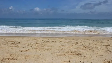Walk along the ocean beach with breaking waves Stock Footage 79848987