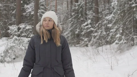 Walk along the snow-covered path of the winter forest among the trees Stock Footage 86206567