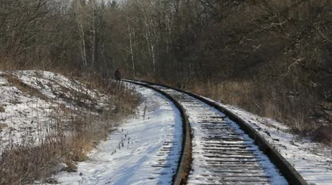 A Walk along Train tracks Stock Footage 10816401
