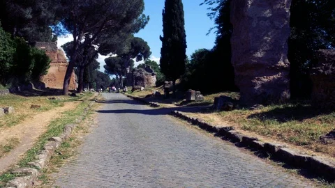 Walk on an ancient road built by the ancient Romans, ancient Appia Stock Footage 90136373