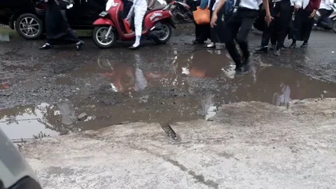 Walk And Jump Over The Damaged Road Stock Footage 219915050