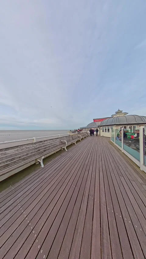 Walk around Cromer Pier. Vertical hyper lapse Stock Footage 329418457