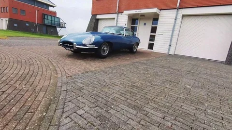 Walk around the Jaguar E type and look inside Stock-Footage 117170852