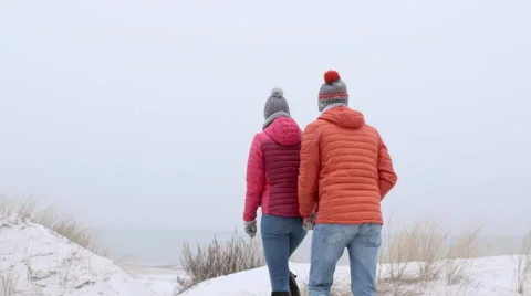 Walk on the beach running down a sand sune Video stock 62699883