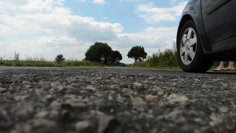 Walk on bicycles on the road Stockbeeldmateriaal 112738162