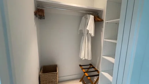 Walk-In Closet with Robe Stock Footage 254908286
