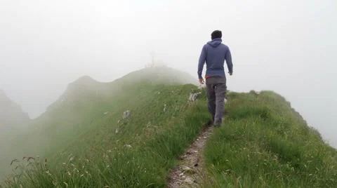 Walk in the clouds on a mountain Stock Footage 50903858