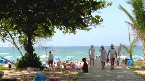 Walk on the crowded Phuket beach Stock Footage 157429214