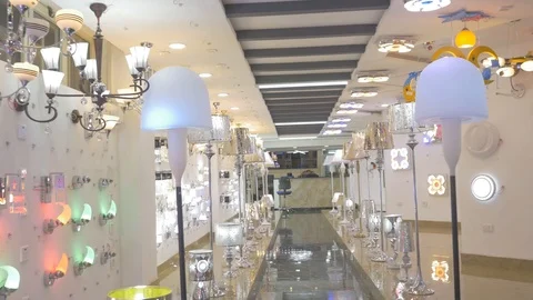 Walk in display through different designs of lightings Stock Footage 97573446