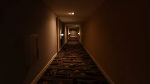 Walk Down A Dark Hallway With Door Lamps Illuminated Stock Footage 337143554