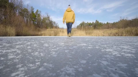 Walk in an ice lake Stock Footage 148165539