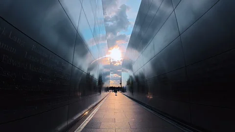 Walk inside the Empty Sky memorial along the metal-plate walls. Low angle view Video stock 323123023